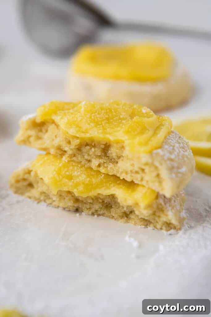 Zesty Chilled Lemon Bar Cookies 3 Stack of lemon curd cookies, showing the thick layer of lemon curd