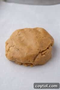 Peanut butter cookie dough on baking sheet