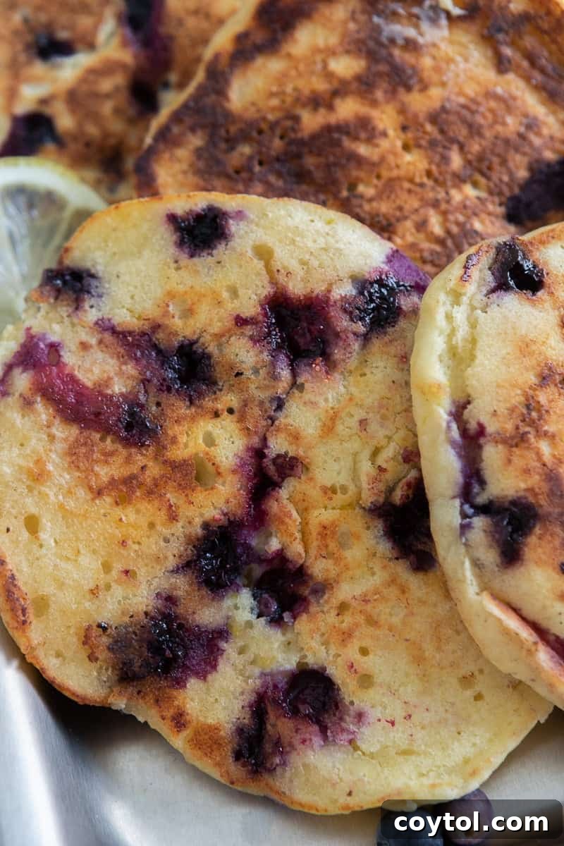 Finished blueberry lemon pancakes on a plate