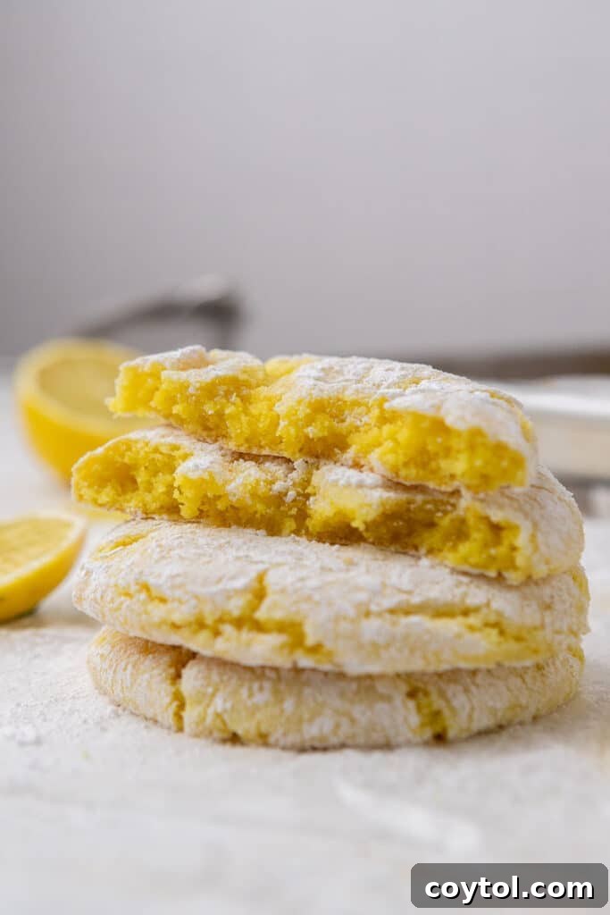 Stack of lemon crinkle cookies made with cake mix