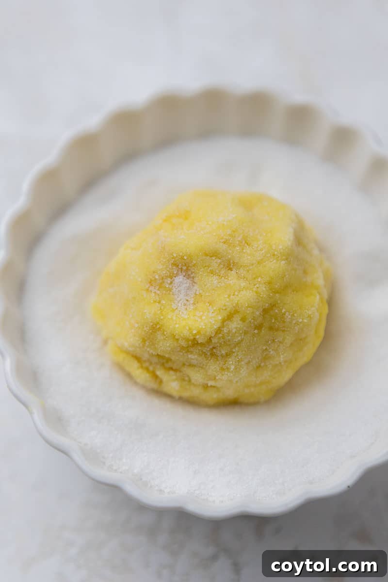 Lemon cookie dough rolled in granulated sugar