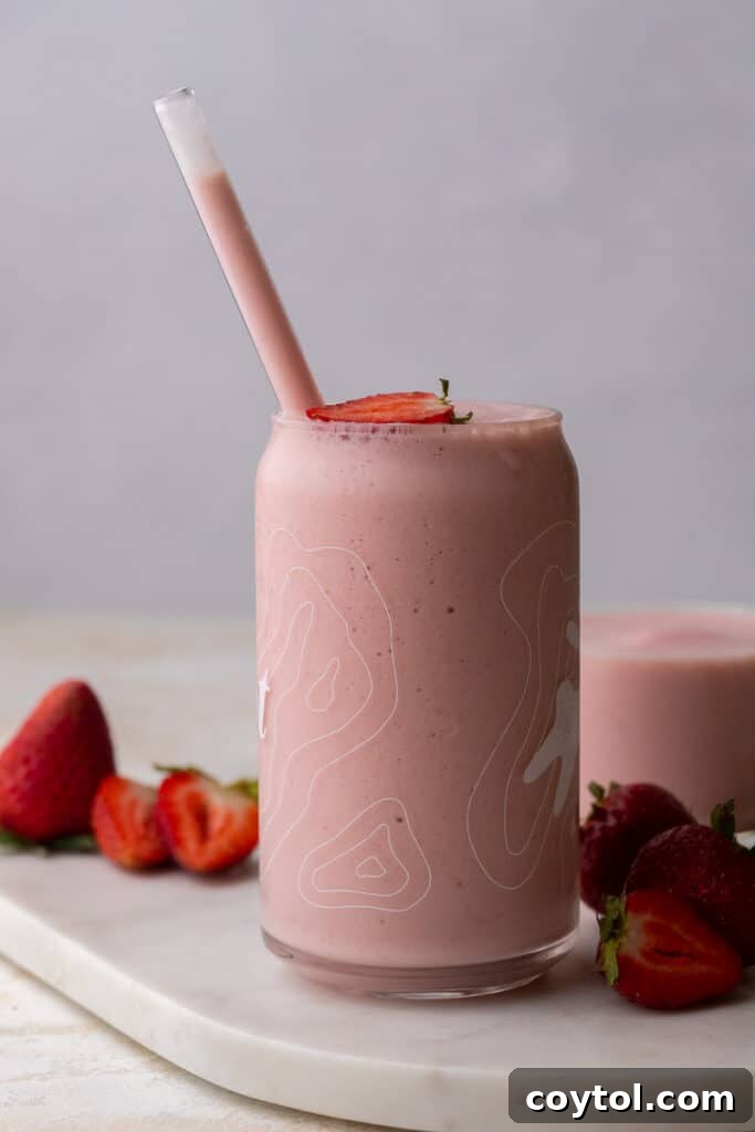 Homemade McDonald's Strawberry Banana Smoothie Copycat in a glass