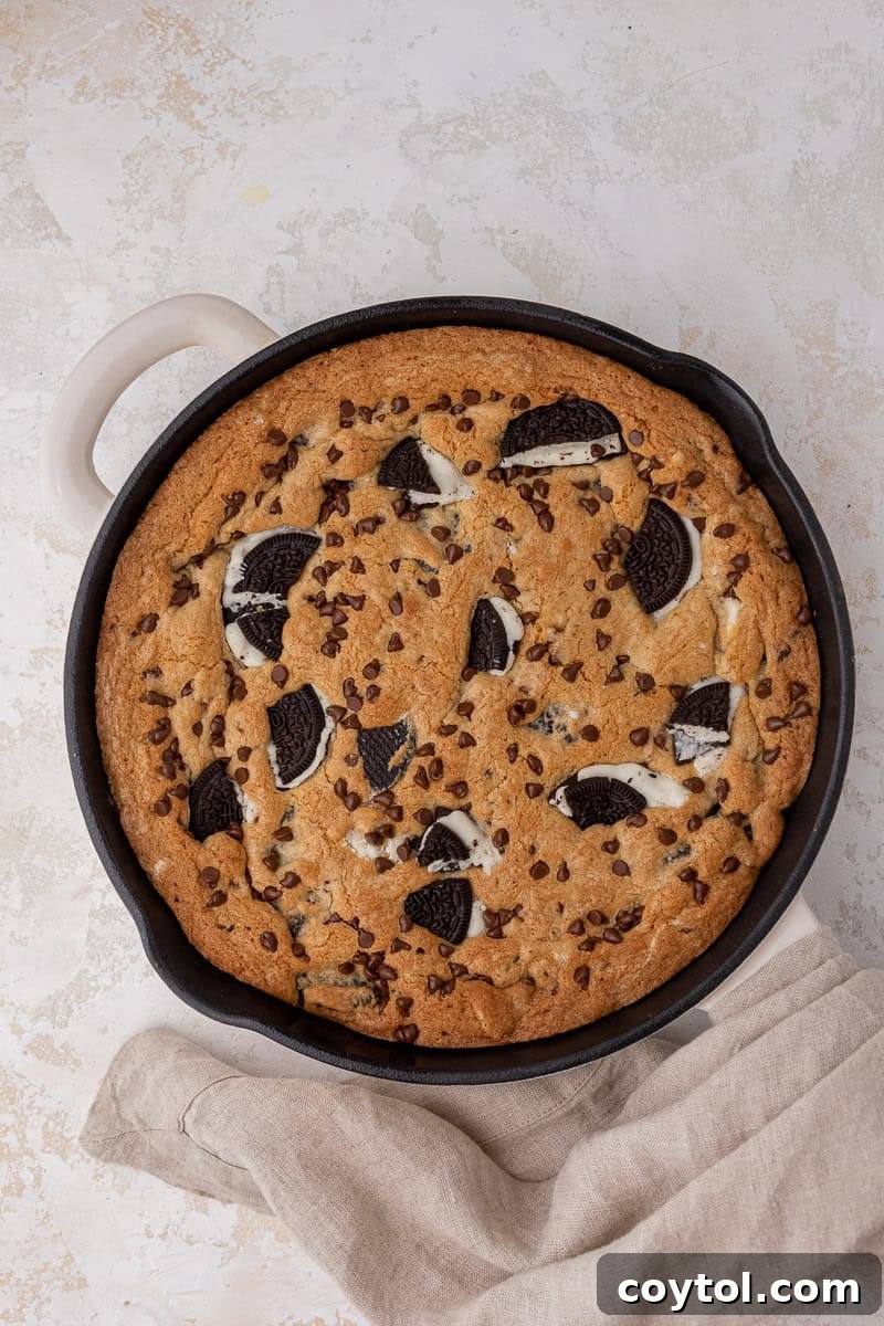 Simple Skillet Oreo Cookies and Cream Pizookie 8 Freshly baked cookies and cream skillet cookie, golden brown and warm.