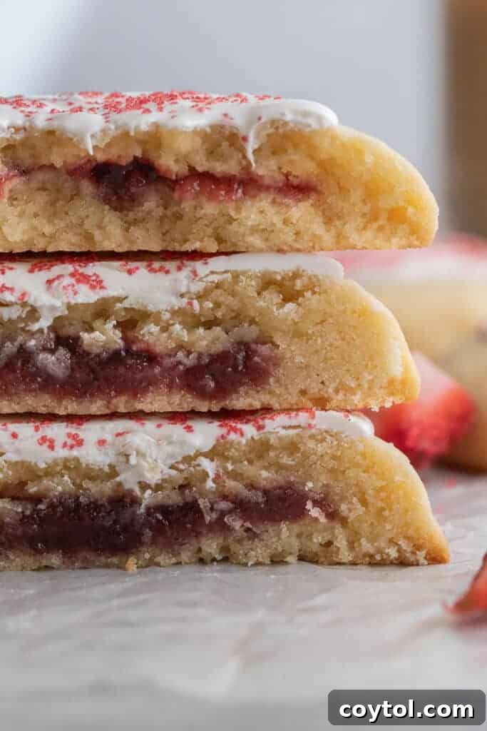 Delicious homemade strawberry pop tart cookies with white chocolate glaze and sprinkles
