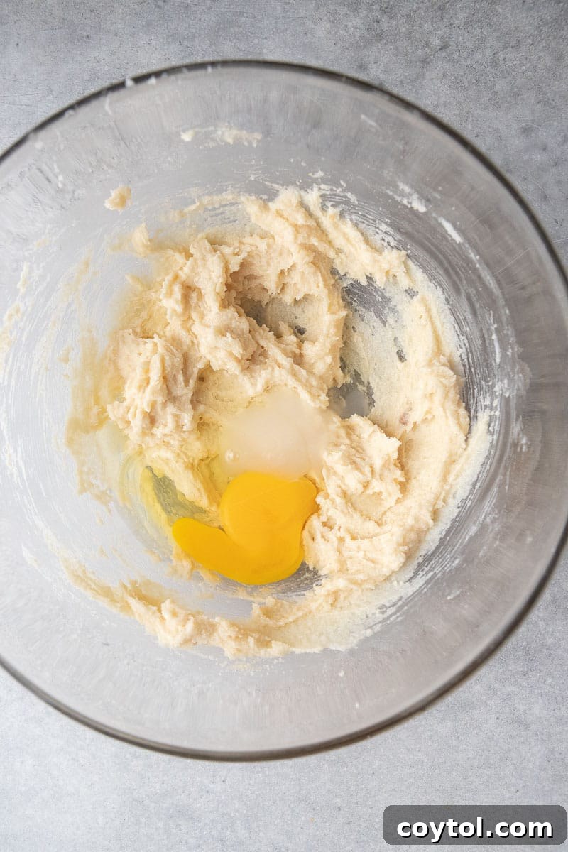 Creamed butter and sugar mixture in a bowl