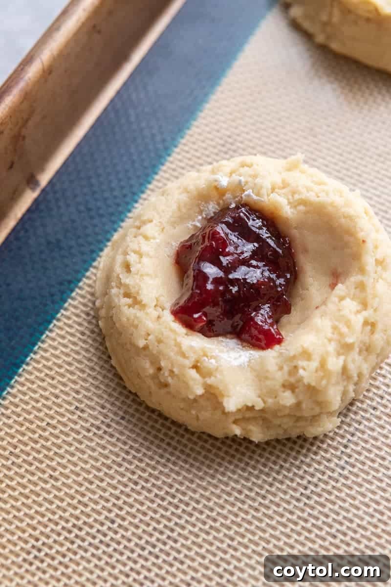 Cookie dough filled with strawberry jam