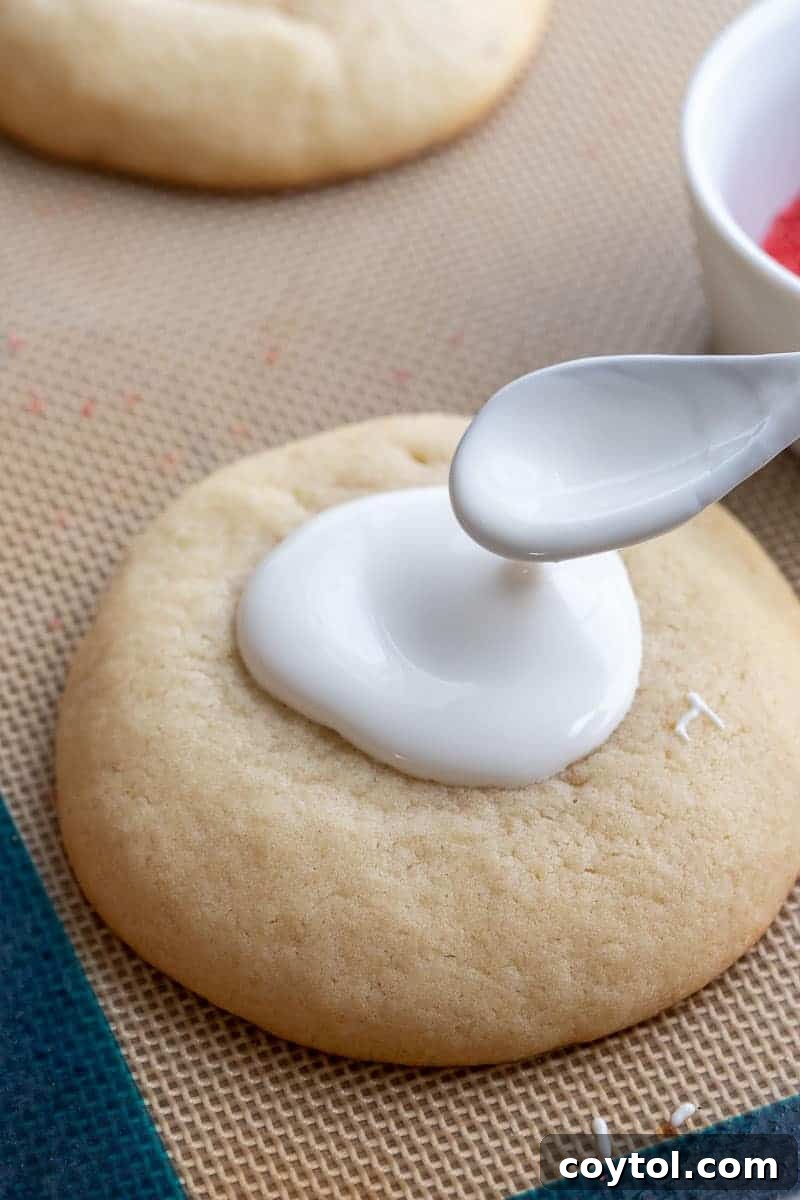 Cookie with melted white chocolate glaze applied