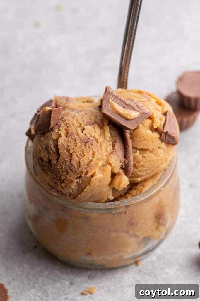 Close up of creamy peanut butter cookie dough with mix-ins