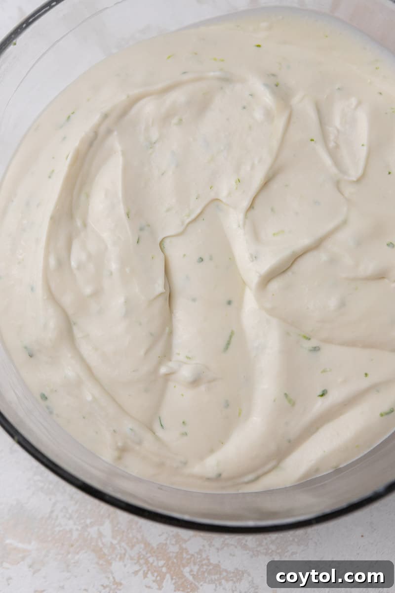 Creamy pie filling in a bowl, ready to pour