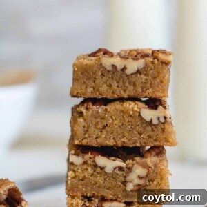 Delicious brown butter pecan blondies, stacked and ready to enjoy.