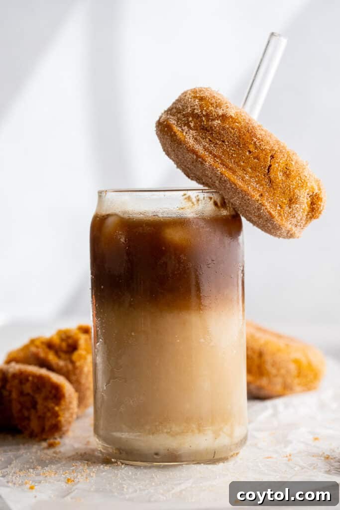 Pumpkin donut served with a macchiato latte