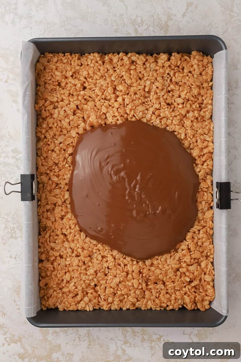 Irresistible Scotcharoos: The Perfect No-Bake Treat 9 Scotcharoos in a pan