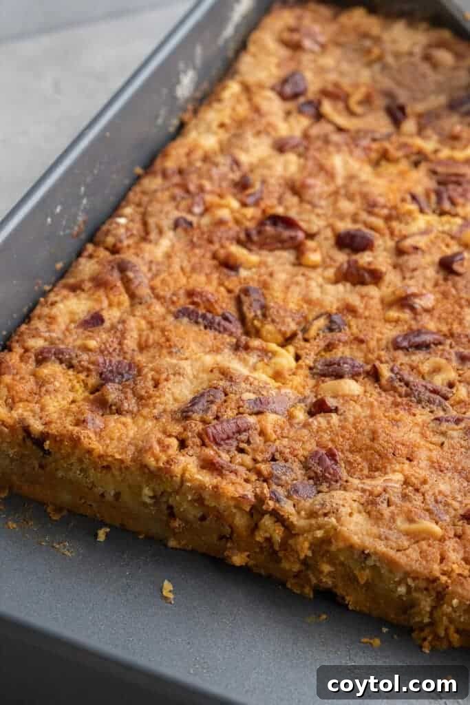 Baking pan of pumpkin and yellow cake mix dessert