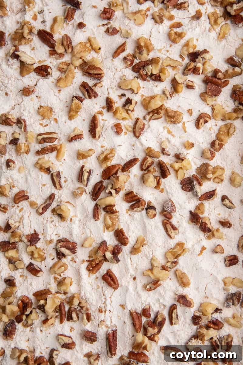 Close up of cake mix and pecan layer