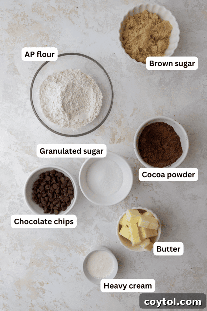 Ingredients for edible brownie batter recipe laid out on a marble surface