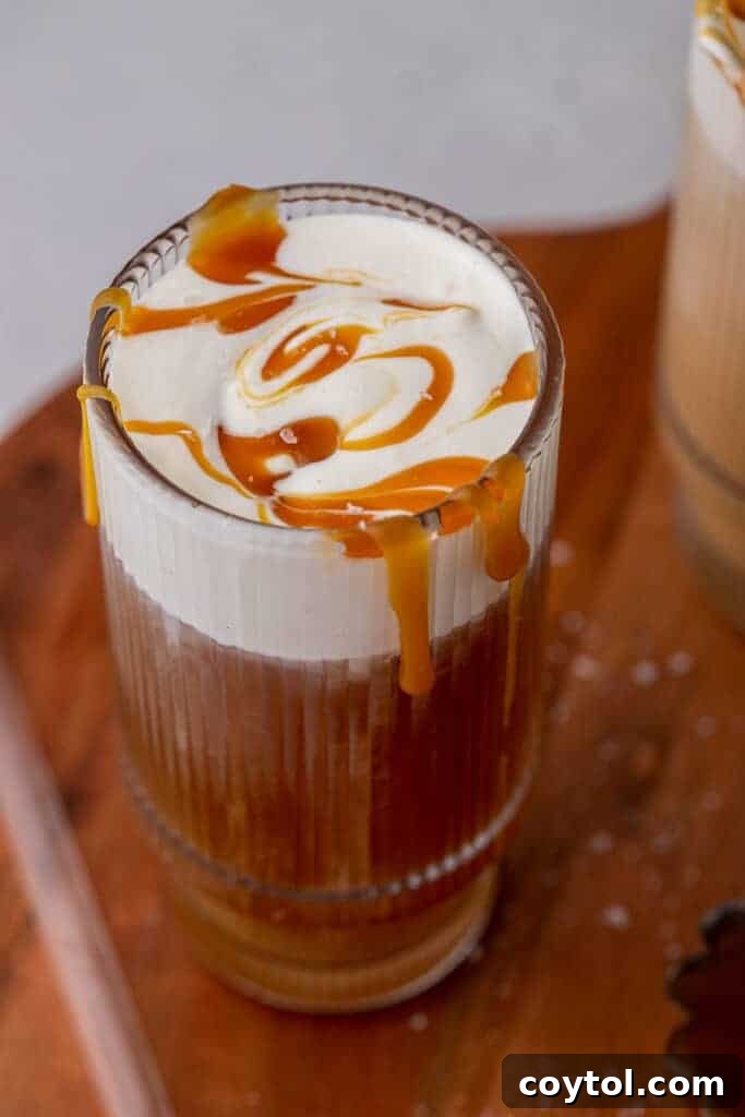 Craft Your Own Starbucks Salted Caramel Cold Foam Cold Brew 2 Homemade Starbucks Salted Caramel Cold Foam Cold Brew in a glass with ice