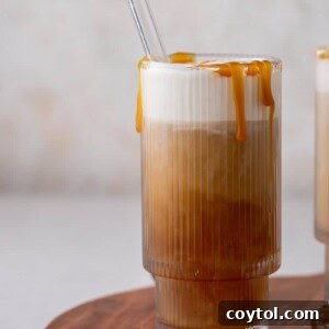 Homemade salted caramel cold foam cold brew recipe in a glass