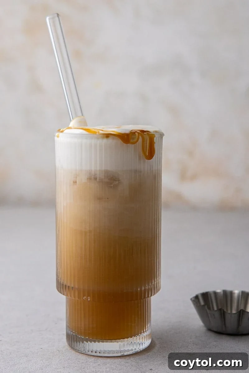 Craft Your Own Starbucks Salted Caramel Cold Foam Cold Brew 8 Starbucks copycat salted caramel cold foam cold brew served in a glass