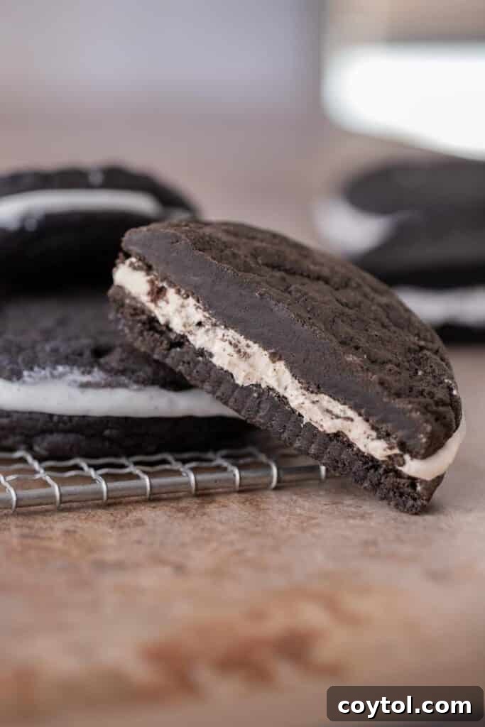 Crumbl's Mallow Oreo Dream Sandwich 11 Oreo mallow cookie sandwich sliced in half