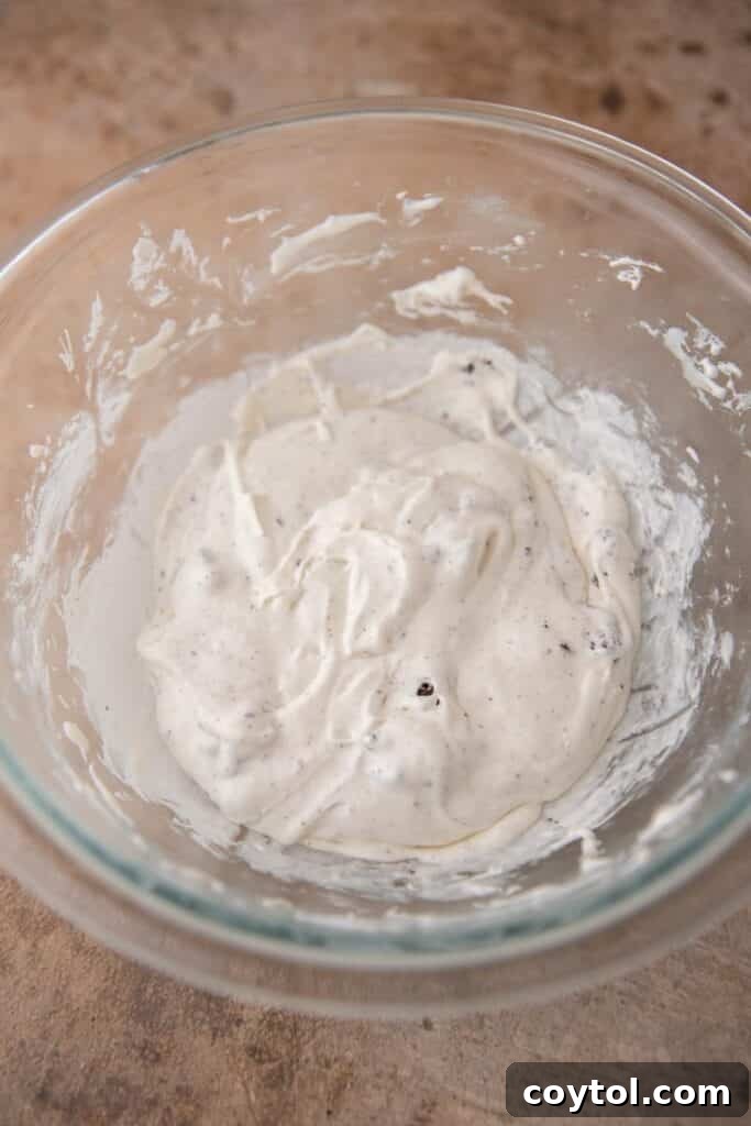 Crumbl's Mallow Oreo Dream Sandwich 8 marshmallow fluff frosting