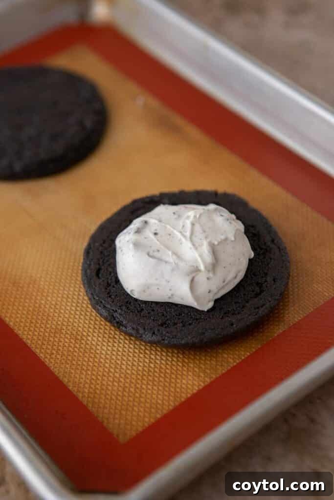 Crumbl's Mallow Oreo Dream Sandwich 9 Cookie with marshmallow fluff in the middle