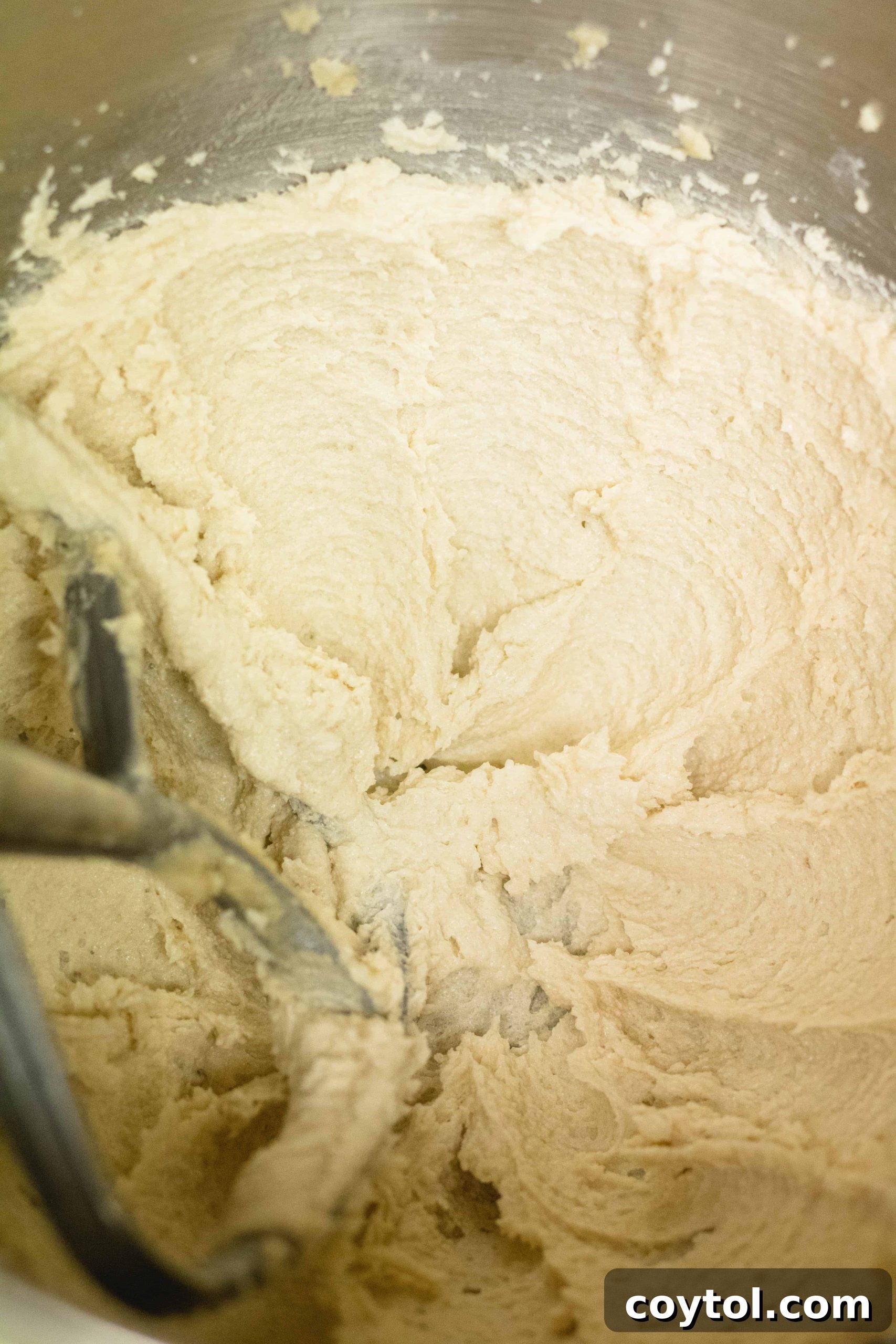 Creaming the butter and the sugar for banana walnut muffins.
