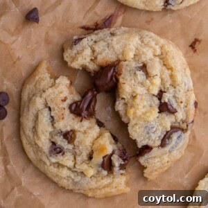 Eggless chocolate chip cookie broken in half