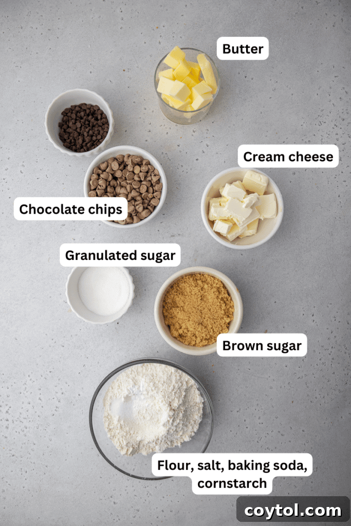 All the simple ingredients for chewy eggless chocolate chip cookies laid out on a kitchen countertop.