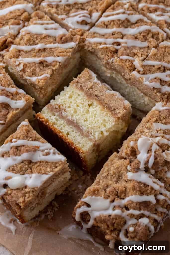 Sliced Coffee cake on baking sheet with glaze