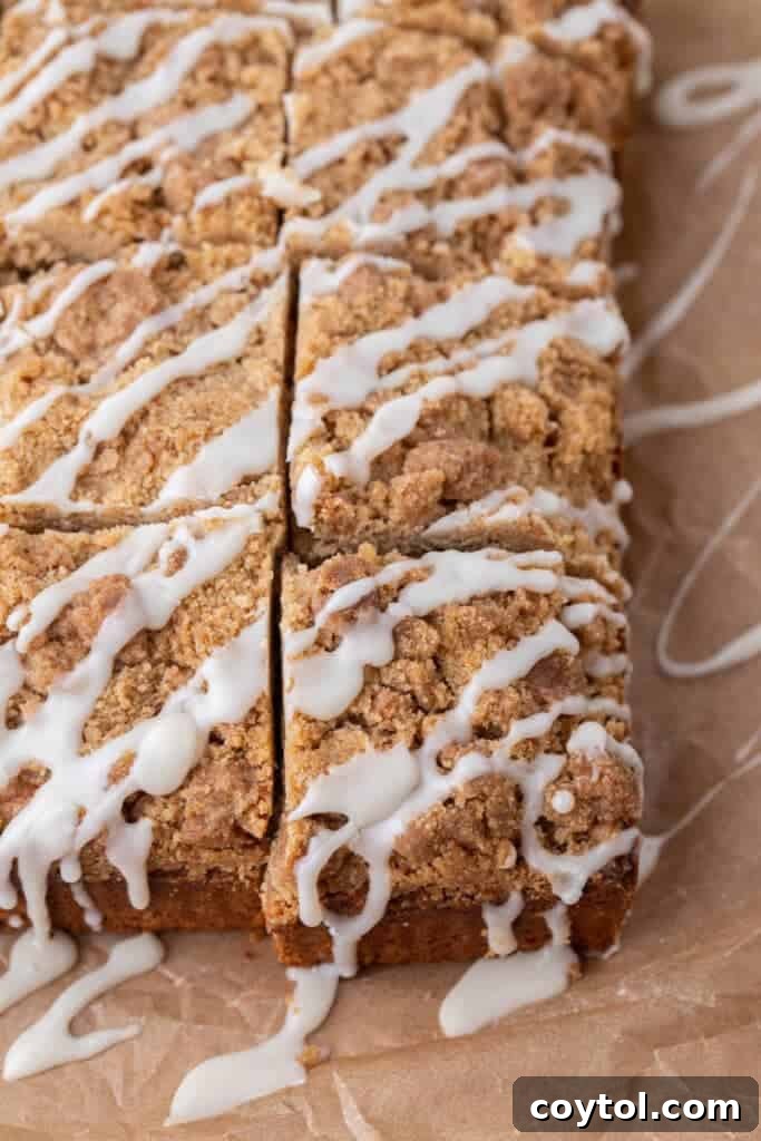 Sliced coffee cake with glaze on top