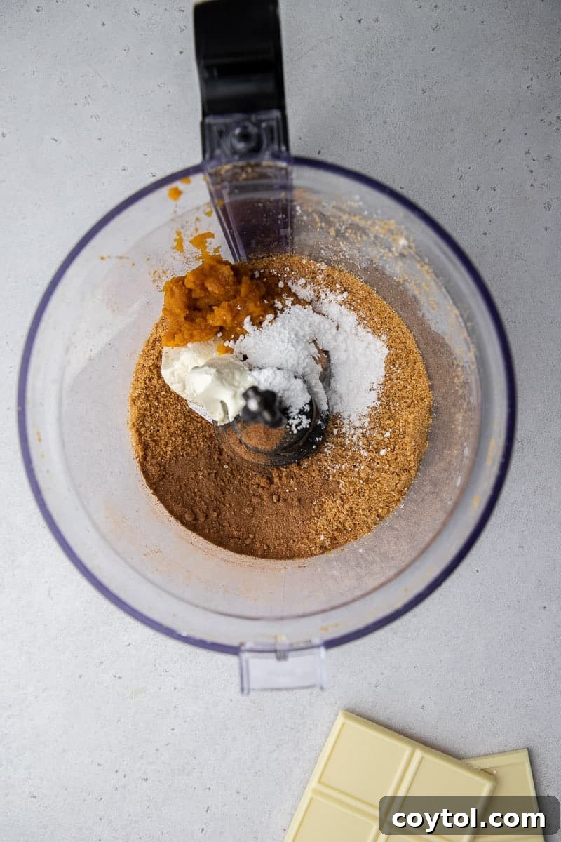 Truffle ingredients in a food processor being blended