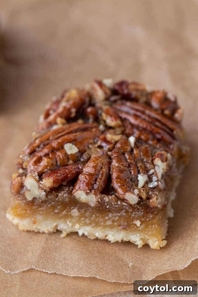 Slice of pecan pie bar