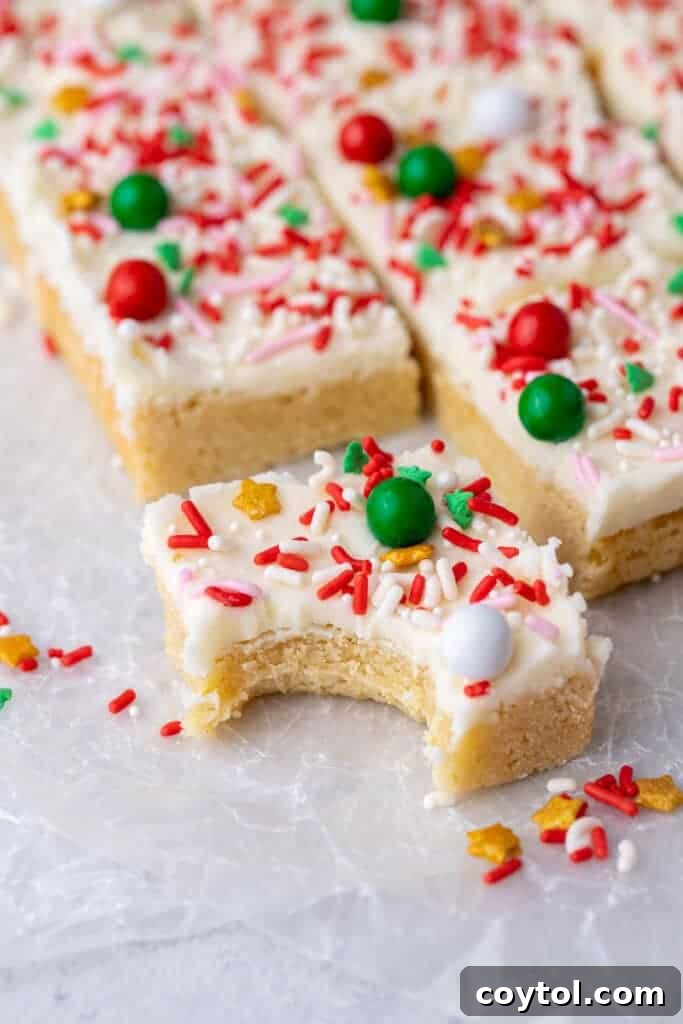 Sugar cookie bars with a bite taken out of it