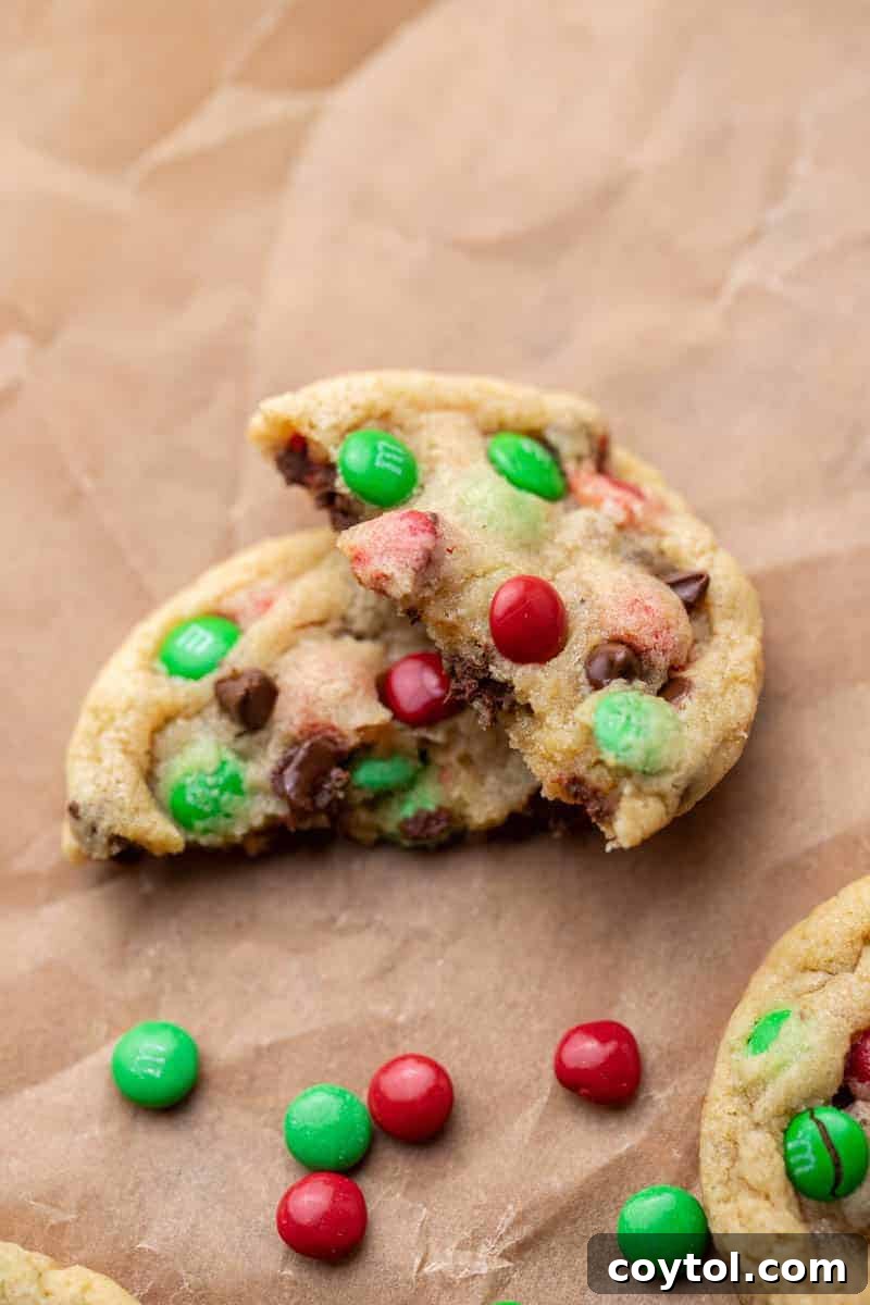 Sparkling Christmas M&Ms Chocolate Chip Cookies 9 Freshly baked Christmas M&M chocolate chip cookies cooling on a wire rack