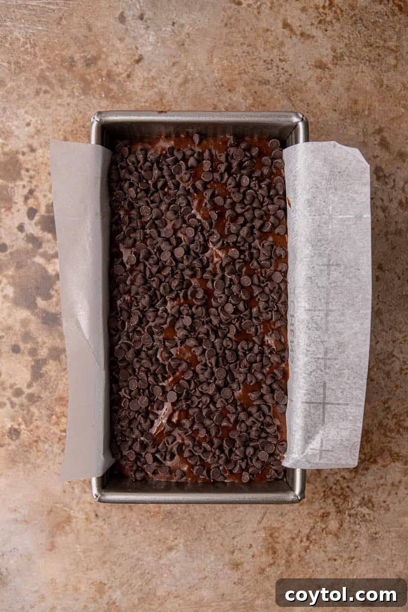 Decadent Double Chocolate Banana Loaf 7 Chocolate banana bread batter in a pan