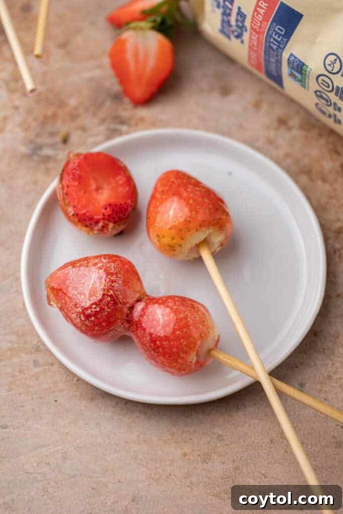 Tanghulu recipe using strawberries on a plate