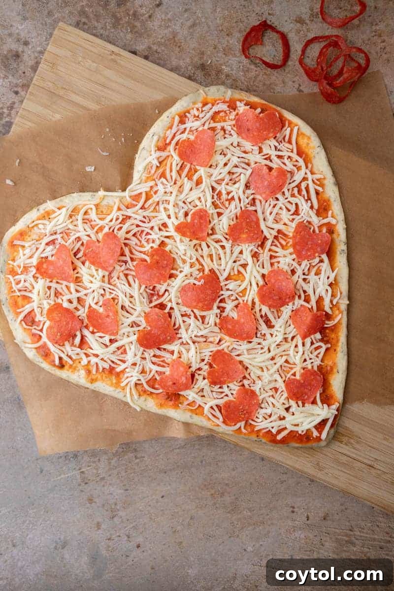 Love-Struck Pizza: Valentine's Heart Recipe 11 pepperoni on pizza dough