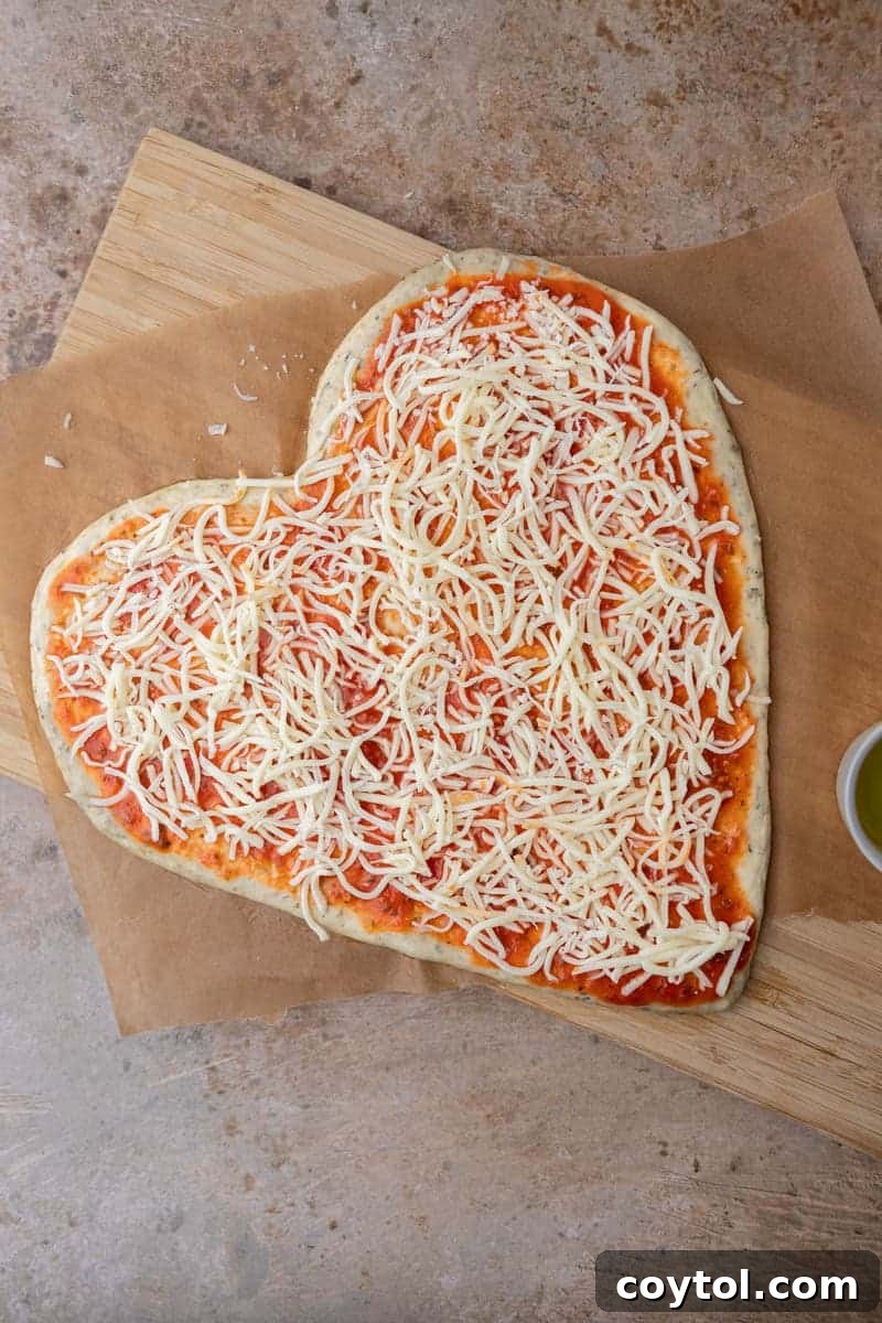 Love-Struck Pizza: Valentine's Heart Recipe 9 Cheese on pizza dough