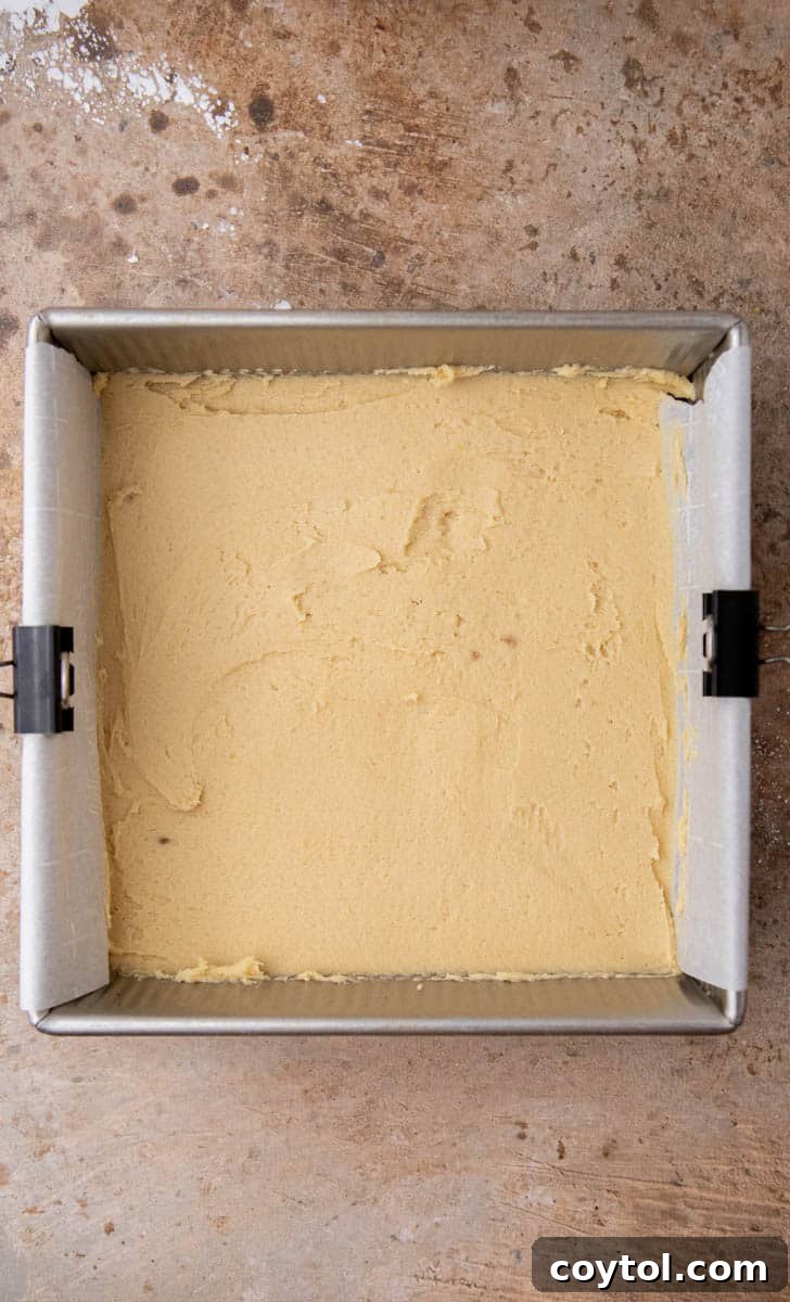 Cookie dough spread on a baking pan