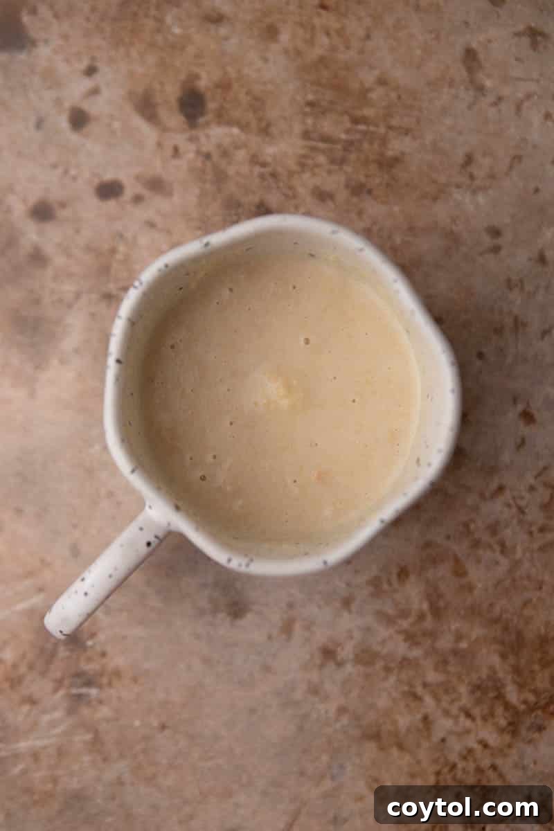 Golden Oreo Gooey Mug Cake in Minutes 5 Golden oreo mug cake batter mixed with milk