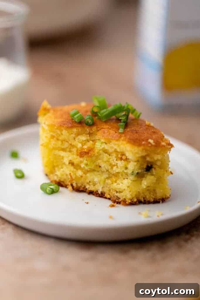 How to make Jiffy cornbread mix better, showcasing a golden brown skillet cornbread