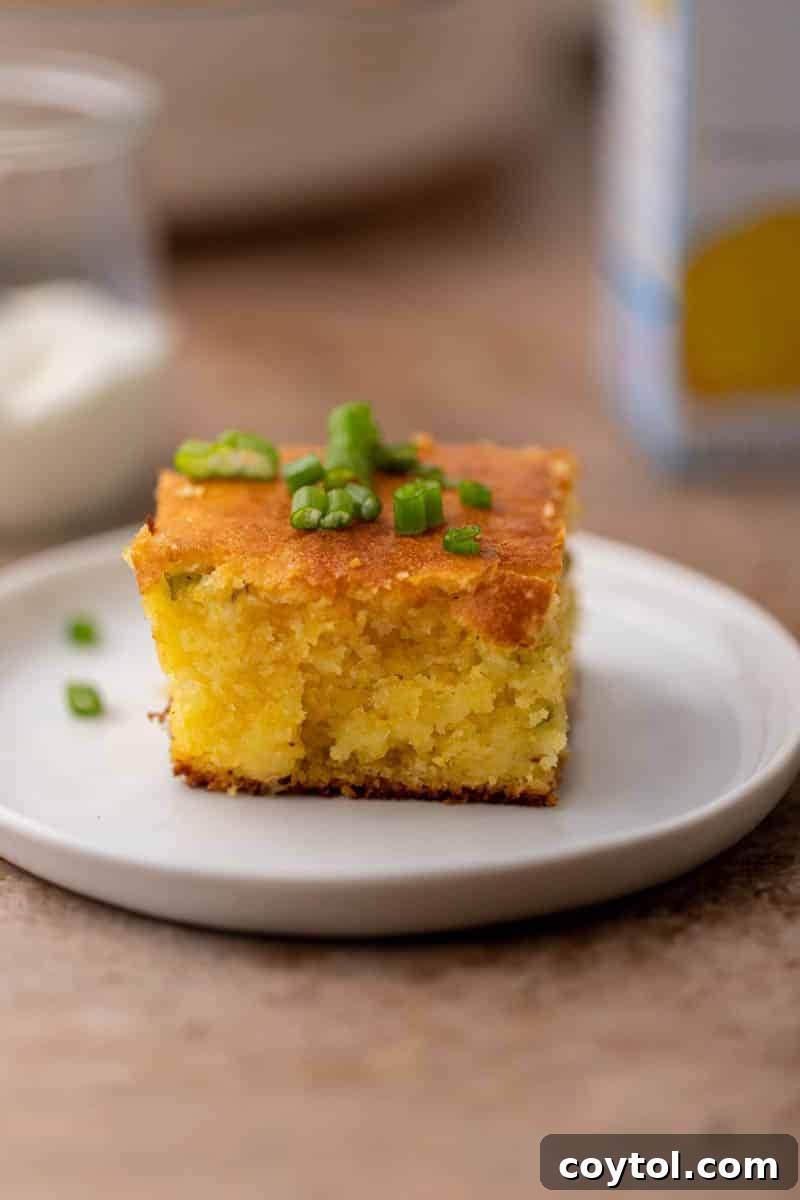 11 secrets to make Jiffy cornbread better, showing a golden top