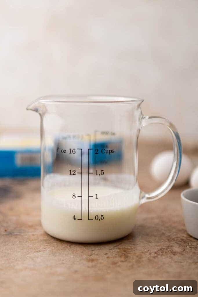 Buttermilk in a glass, an essential ingredient to make cornbread mix better
