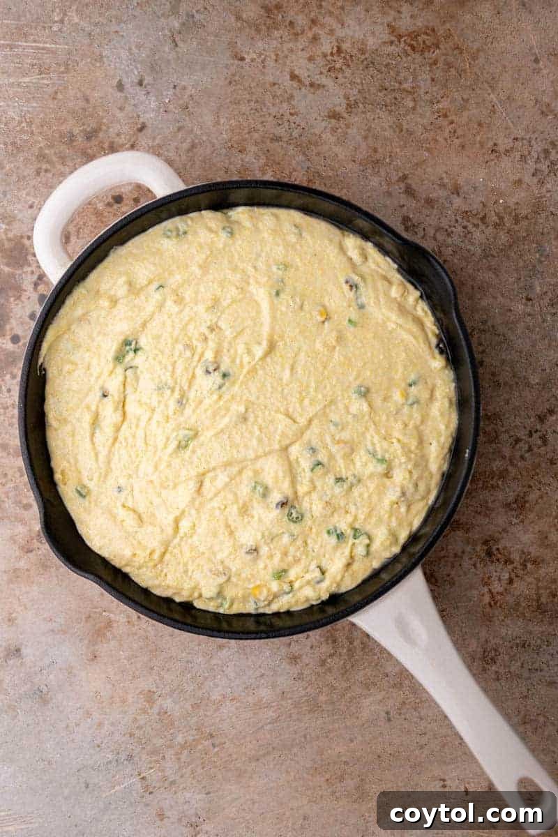 11 secrets to make Jiffy cornbread better, showing a golden crust