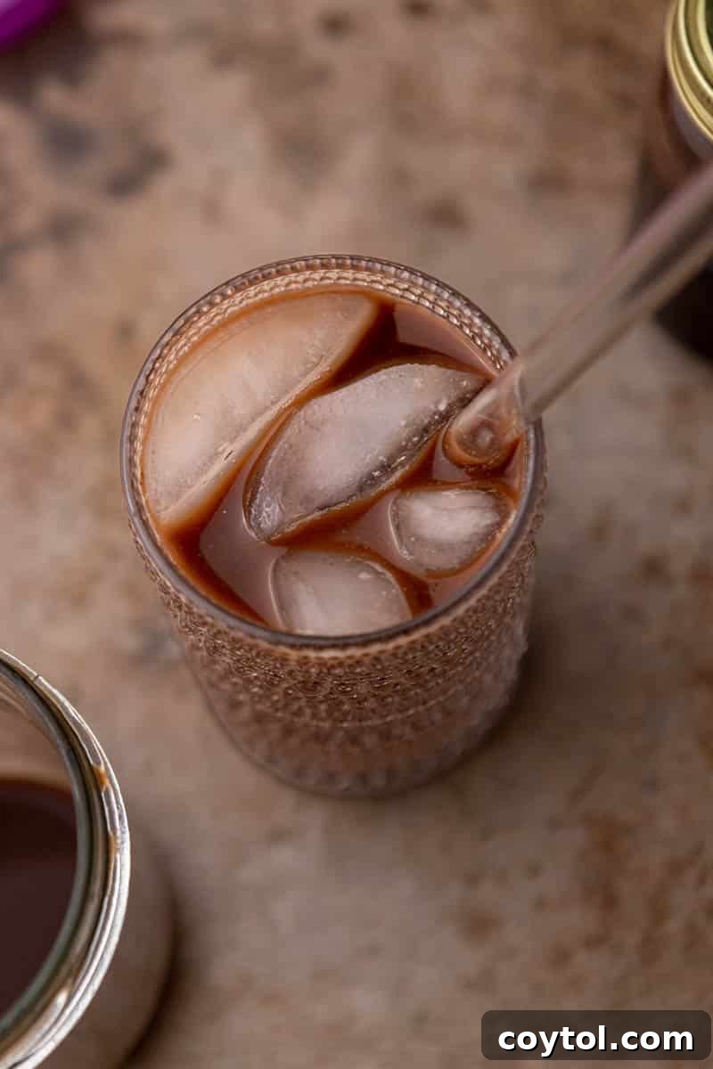 Iced Mocha Cold Brew Coffee Recipe in a glass with whipped cream