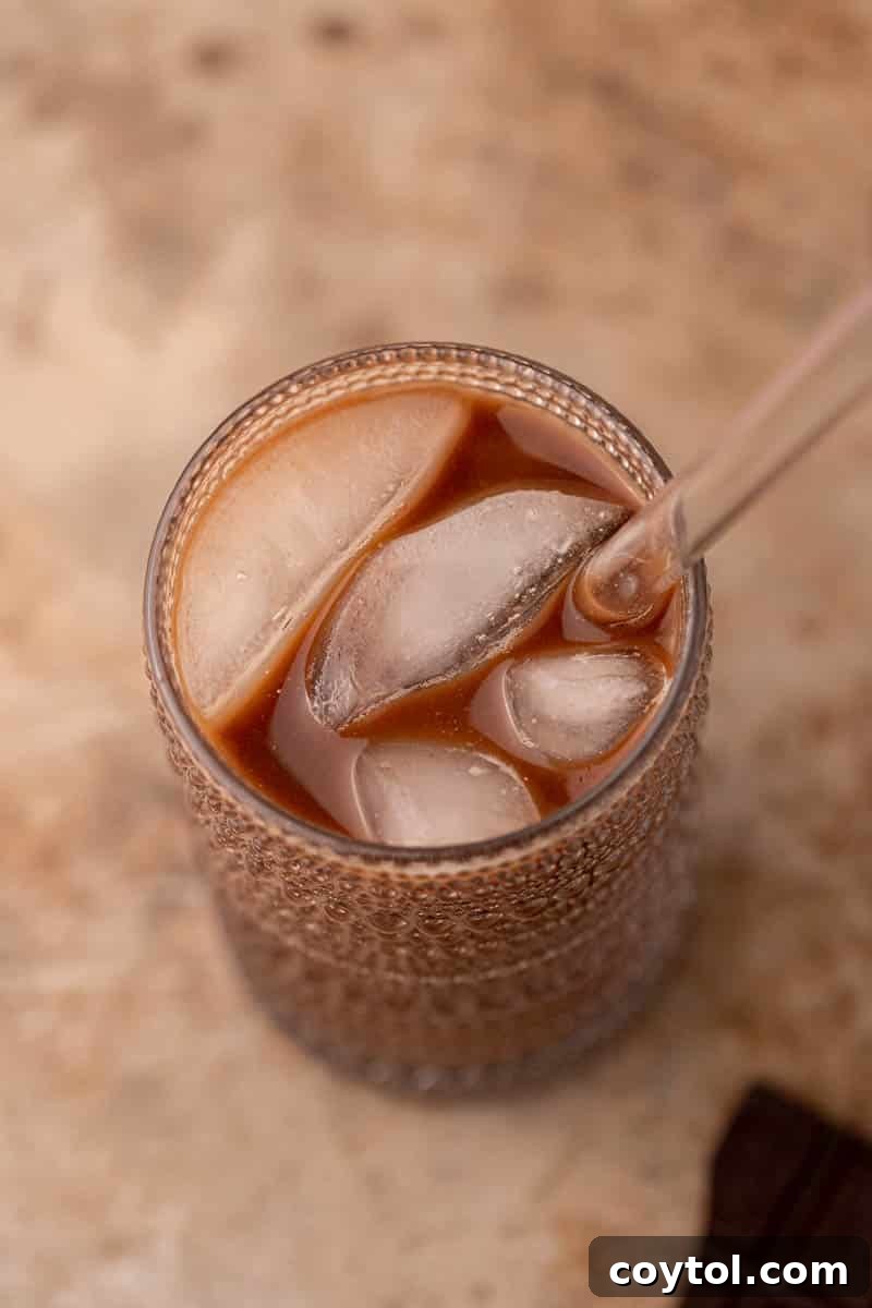 Overhead shot of a delicious cold brew mocha in a glass