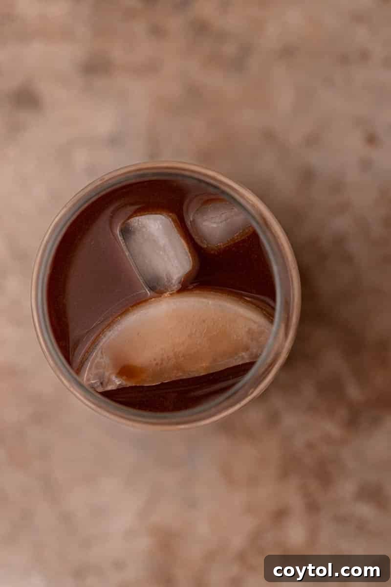 mocha cold brew base in a cup before adding cream