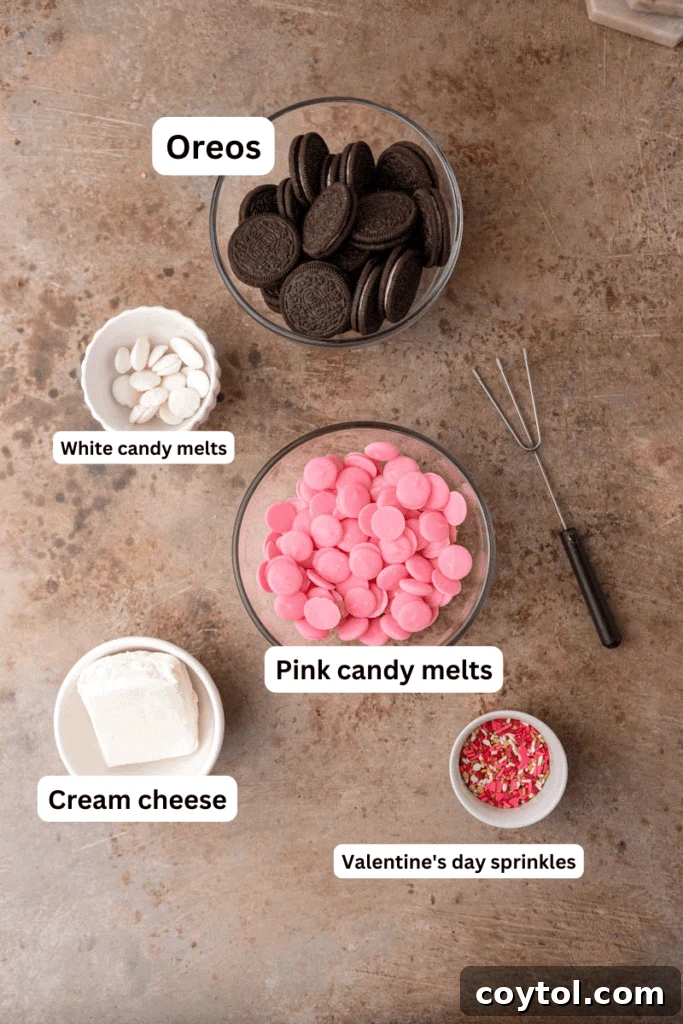 No-Fuss Valentine's Oreo Truffles 3 Ingredients for Oreo truffles laid out on a kitchen counter, including Oreos, cream cheese, and candy melts.