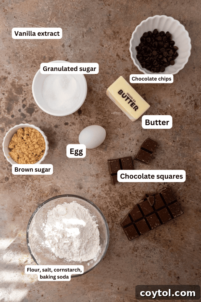 All the dry and wet ingredients laid out on a kitchen counter for chocolate chip cookies