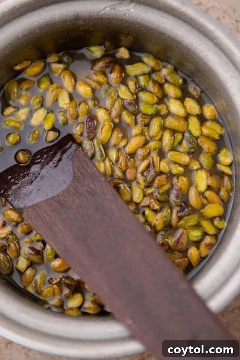 Starbucks Pistachio Coffee Delight 5 Pistachio syrup being stirred in a saucepan